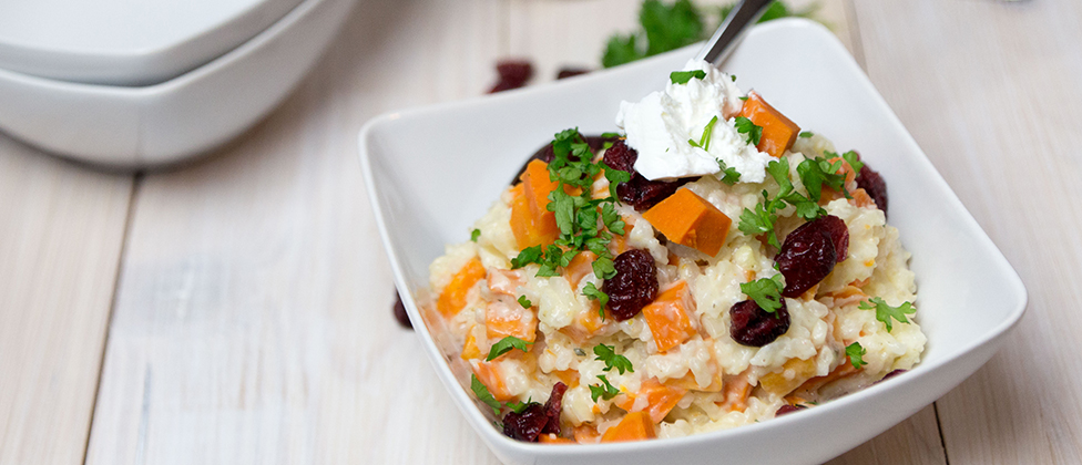 Risotto with sweet potatoes, goat's cream cheese and cranberries