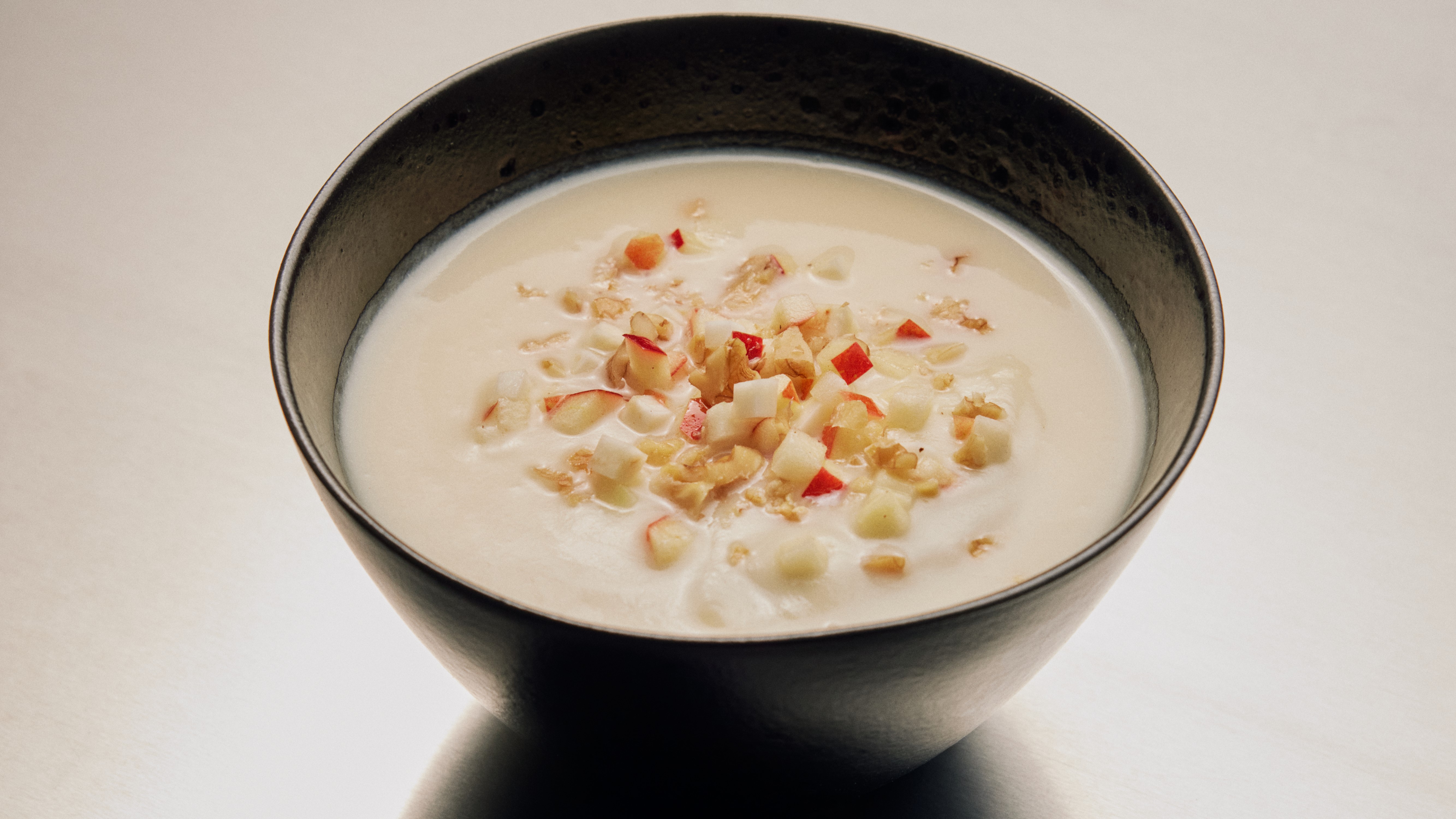 Celeriac soup with apple and walnuts