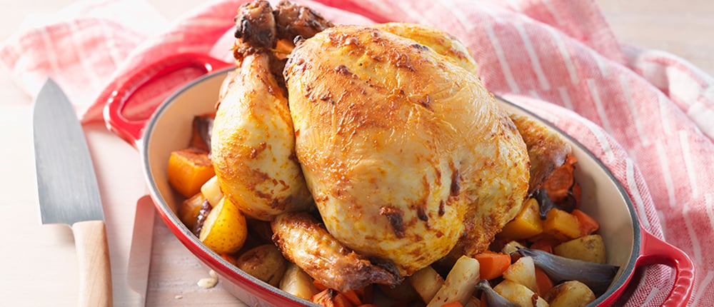 Roasted chicken with root vegetables and potatoes