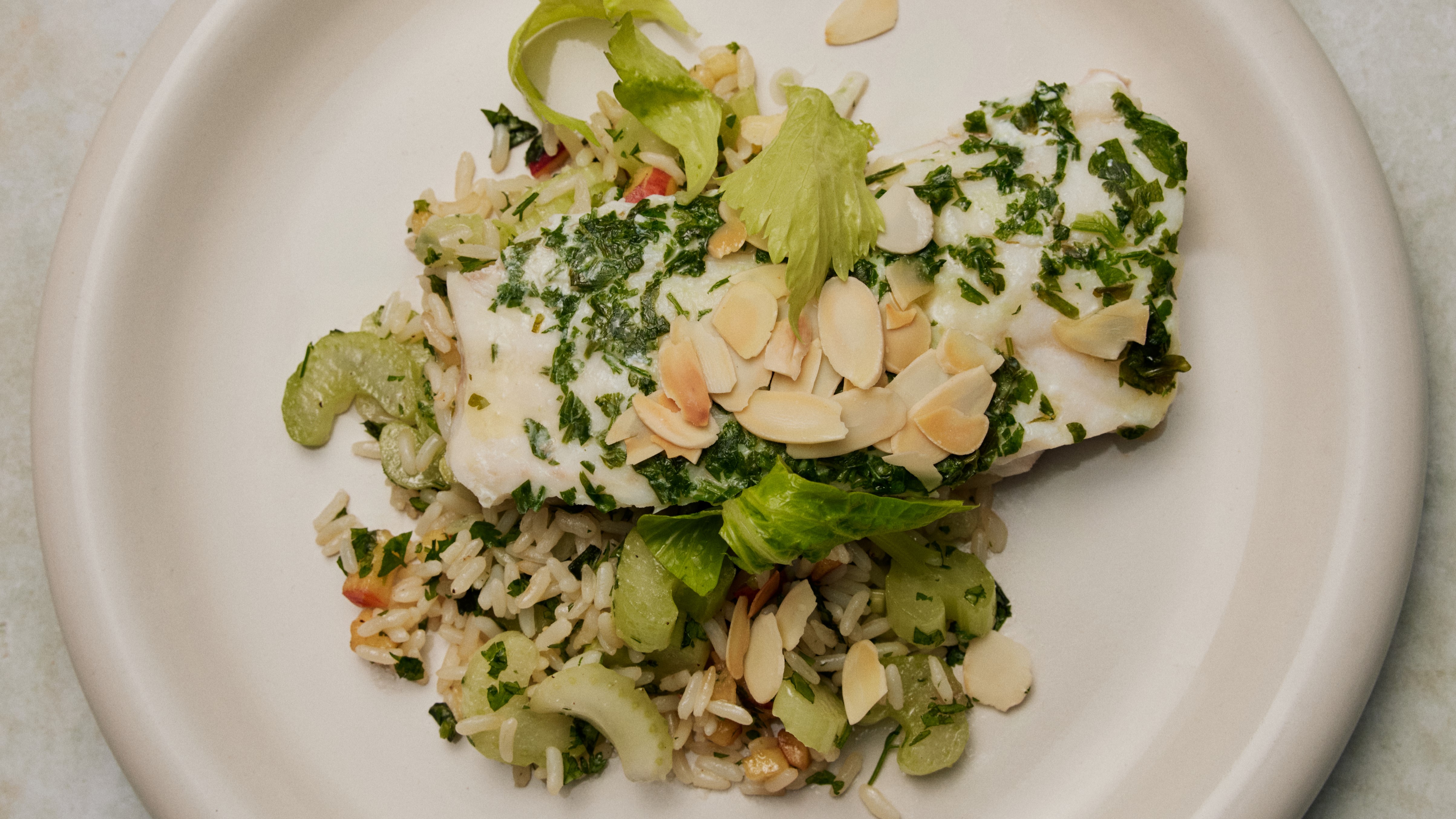 Zander with herbs on a rice salad