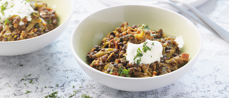 Curry de lentilles aux cacahuètes et aux lardons