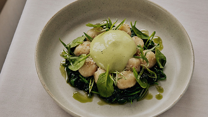 Miso gnocchi with spinach and spring onion hollandaise