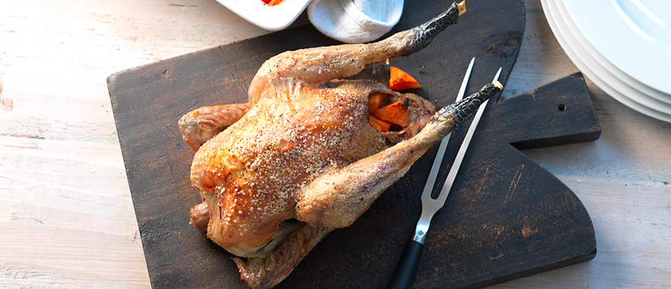 Poulet rôti aux légumes-racines et pommes de terre